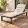 Garden lounger with adjustable backrest and cream cushion on a timber deck