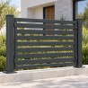Fixed fence panel with horizontal slats on a low wall in front of a modern house