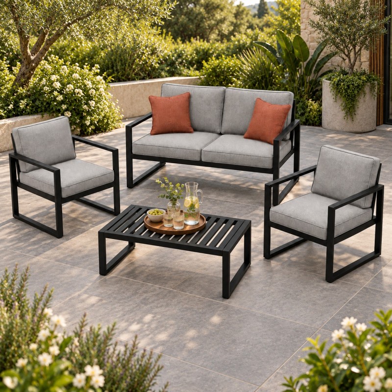 Conjunto lounge de jardín de acero, con cojines en una terraza de jardín