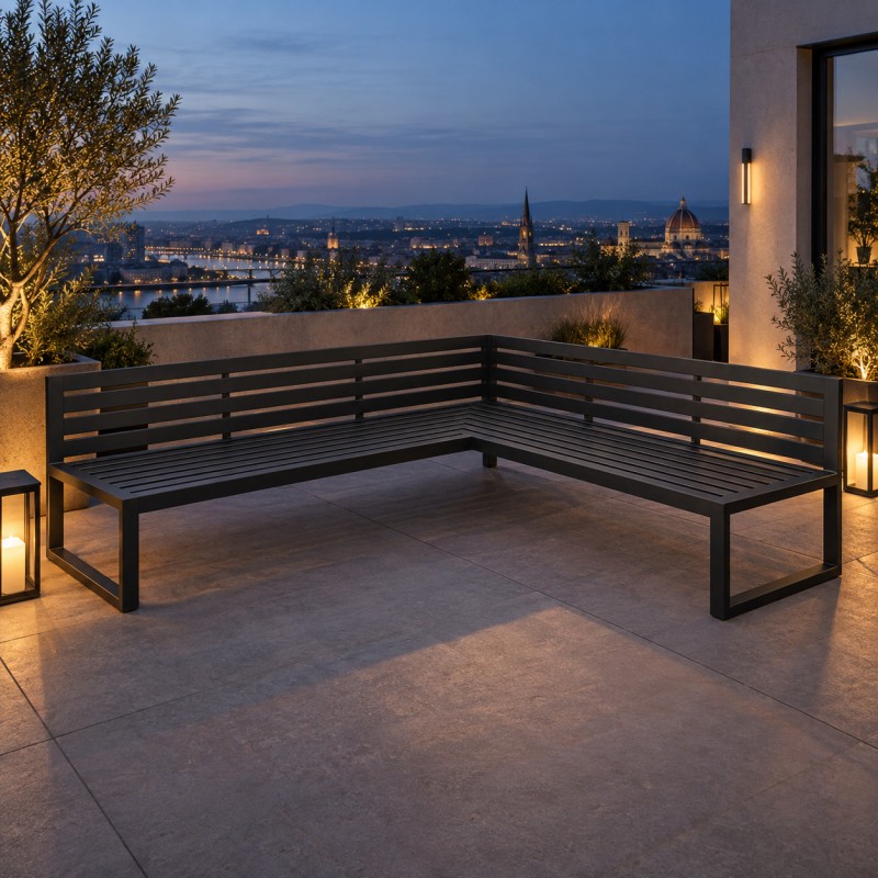 Divano angolare da giardino Loft, nell'angolo di una terrazza sul tetto al crepuscolo