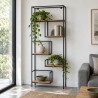 Asymmetric Loft Shelving Unit, with plants and books beside a sofa