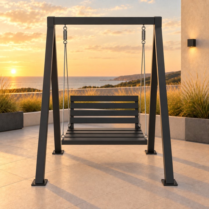 Dondolo da Giardino in Alluminio, su una terrazza vista mare al tramonto