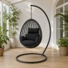 Indoor Hanging Chair with Stand, in a bright conservatory with plants