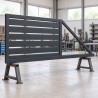 Portail coulissant autoportant horizontal, sur des tréteaux dans un atelier