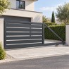 Horizontal Cantilever Sliding Gate, across the driveway of a modern house